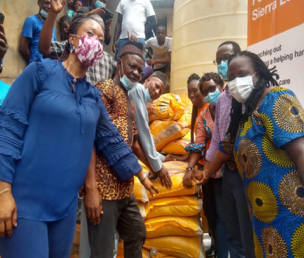 Orange Donates Bags of Rice & Baby Packs to Residents of Kroo Bay